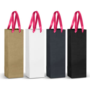 A set of four paper bags in gold, white, navy, and black, each with pink ribbon handles. Each bag has a logo.