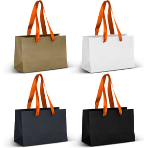 Small ribbon handle paper bags in white, black, gold, and dark grey, featuring orange ribbon handles.