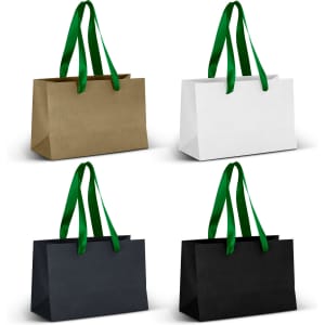 Small ribbon handle paper bags in white, black, brown, and dark green, each featuring green handles.