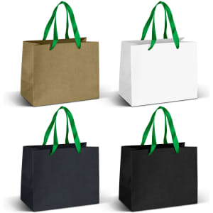 Medium ribbon handle paper bags in khaki, white, and black colours, featuring green ribbon handles and a logo.