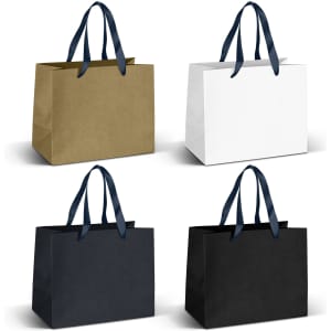 Medium ribbon handle paper bags in gold, white, and black, featuring ribbon handles and a branding logo.