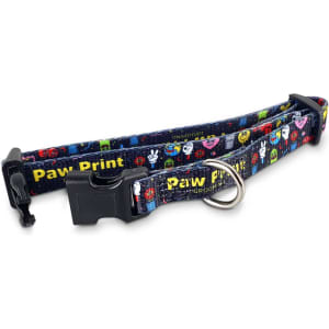 A dog collar featuring a colourful design with various paw prints, adjustable strap, and a clip buckle.