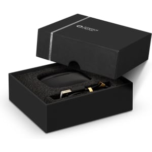 A black box containing Swiss Peak ANC TWS earbuds, with gold accents and a soft inner lining.