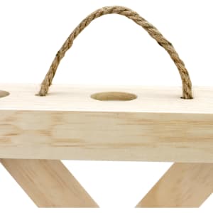 A wooden wine crate with three circular holes and a twine handle, in a natural finish.