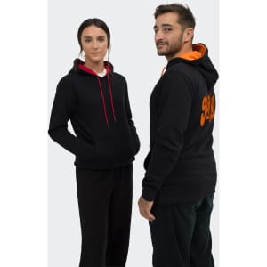 A unisex hoodie featuring a black exterior with a red and orange contrast hood. Includes a logo on the back.