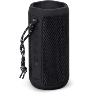 A black cylindrical Bluetooth speaker with textured surface and controls on the side, featuring a decorative strap.