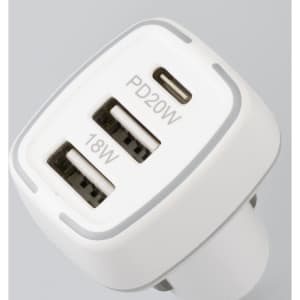A white USB car charger featuring three ports, including one USB-C and two USB-A, with a compact design.