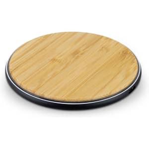 A round, bamboo wireless fast charger with a sleek black base.