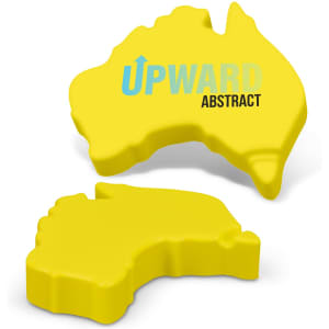 A yellow stress toy shaped like Australia, featuring an abstract design and a logo.