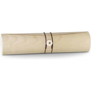 A drink bottle in a wooden tube with a natural finish, secured with a brown leather strap and a button fastener.