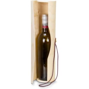 A drink bottle in a wooden tube with a leather strap, featuring a silver cap and dark green liquid inside.