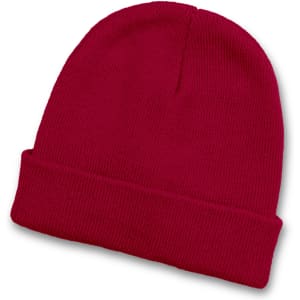 A red beanie with a folded cuff and a textured knit design.
