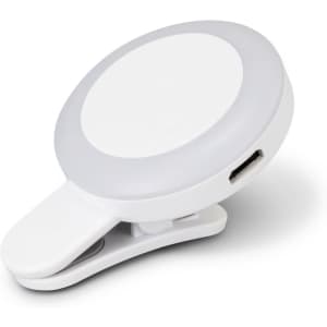 A white Halo Selfie Light with a clip-on feature and a circular design, including a USB charging port.