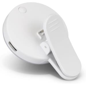A white Halo Selfie Light with a clip design and a small button, featuring a logo on the surface.