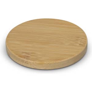 A round bamboo coaster with a smooth, natural finish, featuring a subtle logo on the surface.