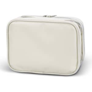 A soft, cream-coloured cosmetic bag with a zip closure and structured design. It features a logo on the exterior.