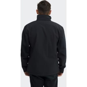A unisex soft shell jacket in black, featuring a high collar and a simple design. The jacket has a logo on the back.