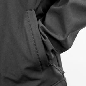 A soft shell jacket in black with a zippered pocket and a streamlined design. Features a branding logo.
