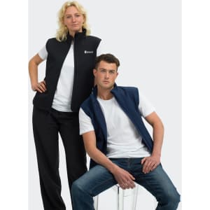 A black men's vest and a navy men's vest are displayed on models against a grey background. Each vest has a logo.
