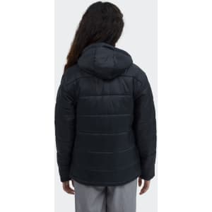 A black women's puffer jacket with a hood, featuring horizontal stitching and a logo on the sleeve.