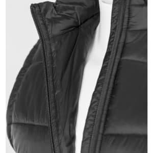 A black puffer vest with a zippered front, featuring a high collar and smooth fabric texture. It has a logo.