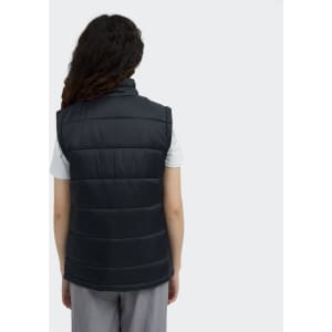 A back view of a women's puffer vest in dark grey, featuring a simple design and a logo.
