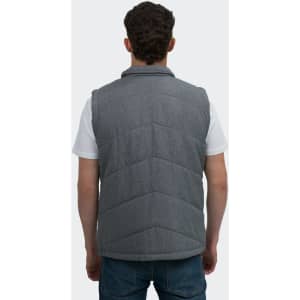 A grey mens puffer vest with a chevron pattern, featuring a collar and a branding logo on the back.