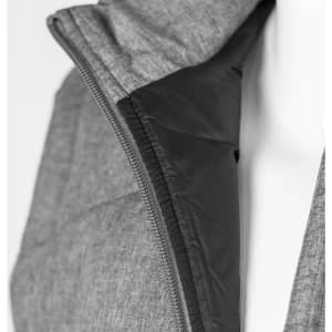 A grey puffer vest with a black interior, featuring a zippered front and a hood. The vest has a logo on it.