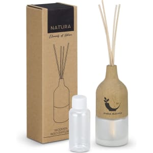 A wooden reed diffuser in a frosted glass bottle, packaged in a simple brown box, featuring natural tones.