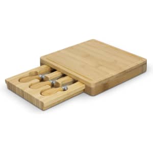 A square bamboo cheese board featuring a sliding section with cheese knives. It has a natural wood finish.