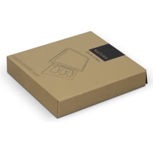 A square cheese board in a brown packaging box, featuring an illustration and a logo.