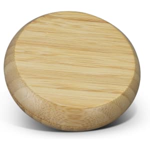 A round bamboo mirror with a smooth surface, showcasing its natural wooden texture and colour.