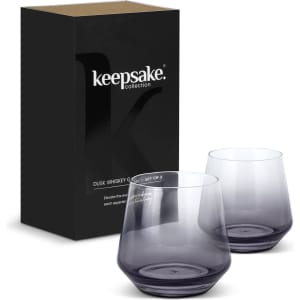 A set of two smoky purple whiskey glasses in a black keepsake box.