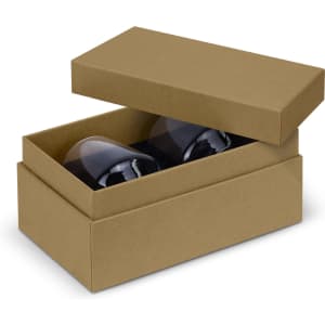 A boxed set of two dark-coloured whiskey glasses in a simple, brown packaging.