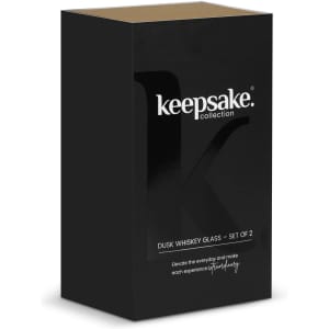 A black packaging box for a set of two Dusk Whiskey glasses, featuring a logo and a sleek design.