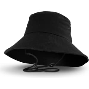 A black Yuma bucket hat with a wide brim and adjustable strap at the base. It features a logo branding.