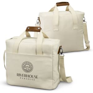 A cream cooler tote bag with wooden handles and an adjustable strap, featuring a logo on the front.