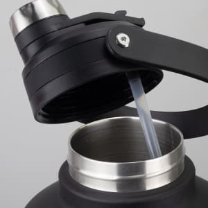 A drink bottle featuring a black exterior and a stainless steel opening with a straw inserted.