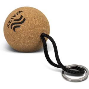A round cork key ring with a black strap and a metal keyring, featuring a logo.