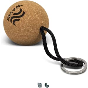 A round cork key ring with a black cord attachment and a metal key ring, featuring a logo.