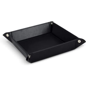 A black valet tray featuring a square design with folded corners and snap buttons, made of textured material.