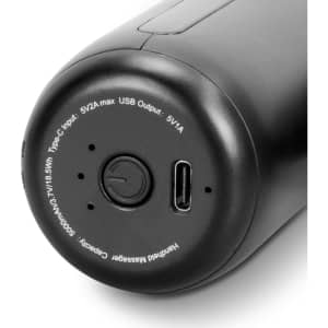 A black handheld massager with a compact design featuring a USB-C input and an on/off button.