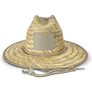 A straw hat with a wide brim, featuring a beige band and a logo patch on the front.