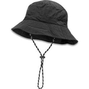 A black packable bucket hat with a chin strap, featuring a textured surface and wide brim.