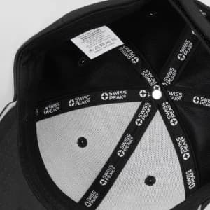 A black cap featuring an inner lining with branding and ventilation holes.
