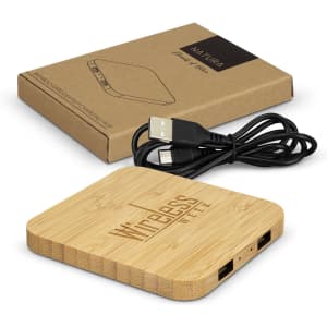 A bamboo wireless charging hub with two USB ports, accompanied by a brown cardboard packaging and a USB cable.