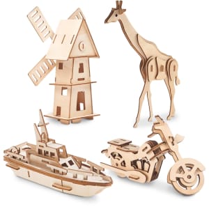 A collection of wooden novelty items including a windmill, giraffe, boat, and motorcycle model kits.