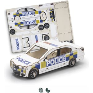 A model police car in white and blue, alongside a flat sheet with design cutouts for assembly.