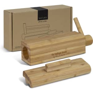 A bamboo sushi maker with a wooden lid and a removable piece, presented with a decorative box.