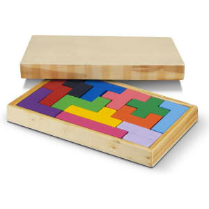 A wooden puzzle set with multicoloured geometric pieces, housed in a natural wooden box with a lid.
